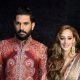 New Delhi:  Cricketer Yuvraj Singh and his wife Hazel Keech pose for a photograph during their reception party in New Delhi on Wednesday. PTI Photo (PTI12_7_2016_000335B)